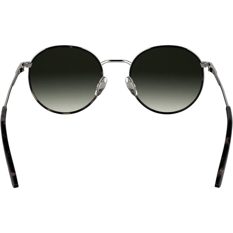 Lentes de sol Calvin Klein CK25101S con diseño redondo y marco de metal, incluyendo almohadillas nasales ajustables para mayor comodidad