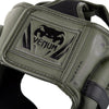 Casco protector Venum Elite: ligero y ajustable, perfecto para boxeo y MMA, con diseño ergonómico y malla ventilada