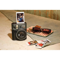 Fujifilm Instax Mini 41 Cámara instantánea en color negro con accesorios y película instantánea Fujifilm