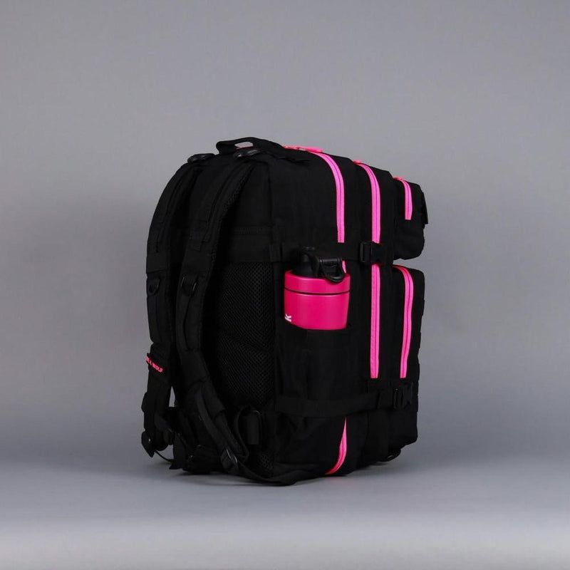 WOLFpak Mochila para portátil 45L rosa neón, táctica y resistente al agua, con parches personalizables y apertura de 180 grados
