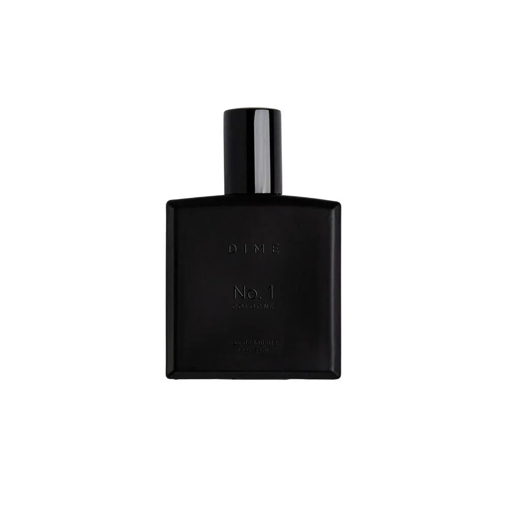 DIME Colonia No. 1 para hombres, con fragancia de maderas de ámbar, cardamomo y cuero. Ideal para uso diario o especial
