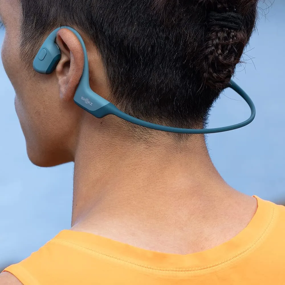 SHOKZ OpenRun Pro - Open-Ear Bluetooth Bone Conduction Sport Headphones - Sweat Resistant Wireless Earphones for Workouts and Running with Premium Deep Base - Built-in Mic, with Hair Band