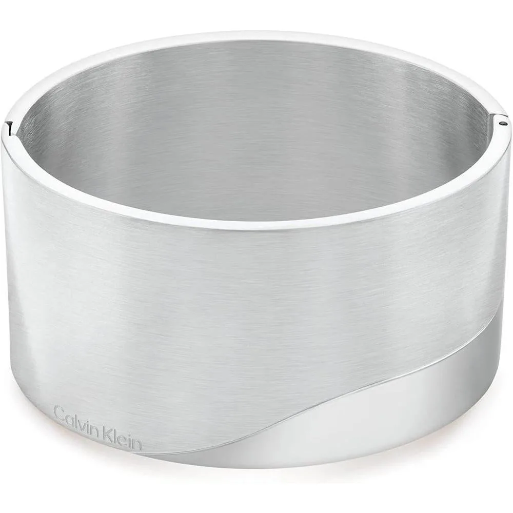 Calvin Klein Women's Bangle Bracelet: Elegant Minimalism with Contrasting Finishes