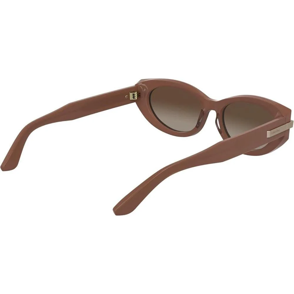 Calvin Klein Gafas de Sol para Mujer con Diseño Sofisticado, Estilo Ojo de Gato, Rosa Opalina con Lente Gradiente